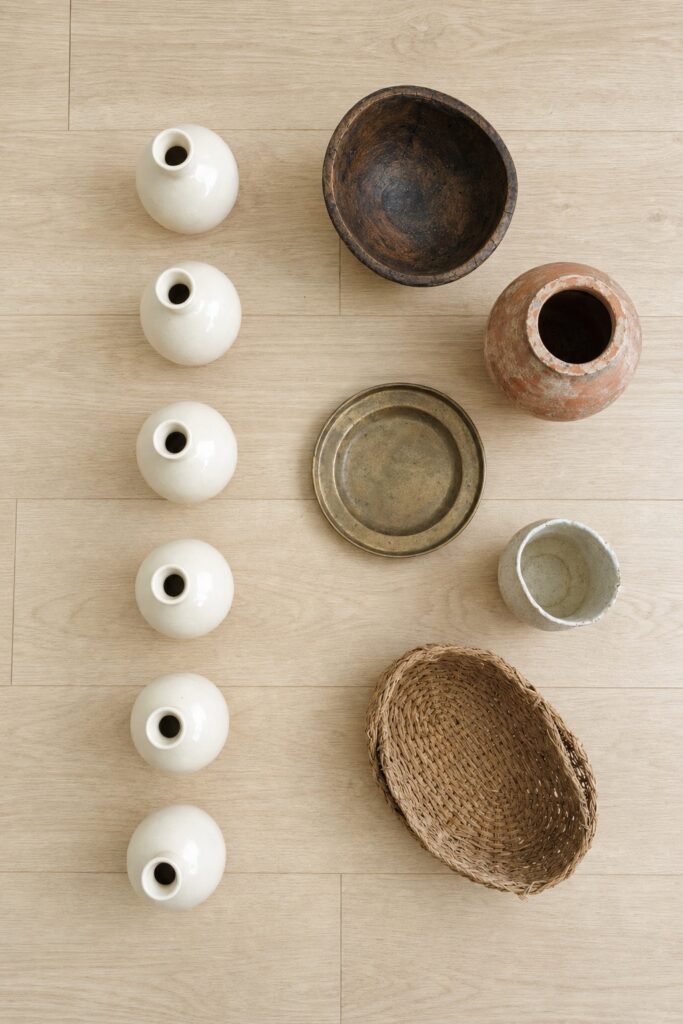 A matching set of identical new decor objects compared with a mismatched collected group